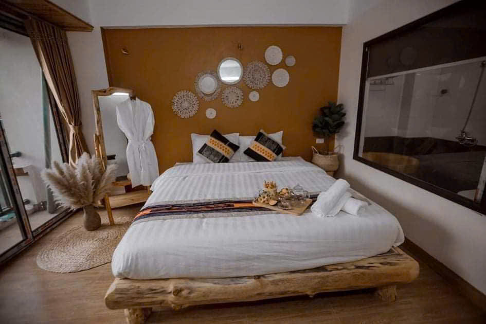 Room with breakfast tray on the bed